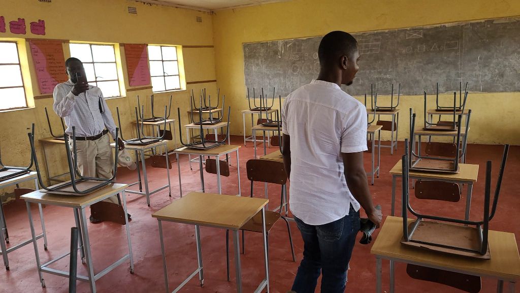 Freshly arranged student desks inside the new classroom