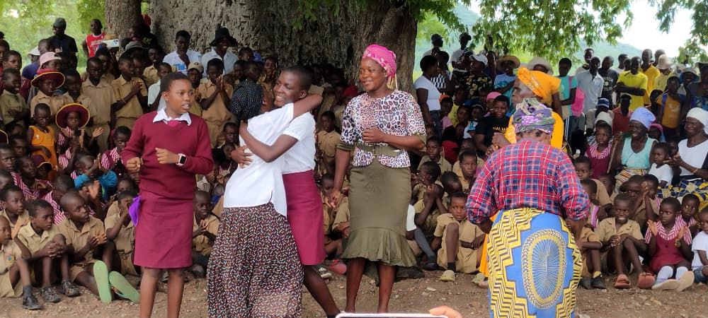 Emotional moment as a girl student receives her gift pack